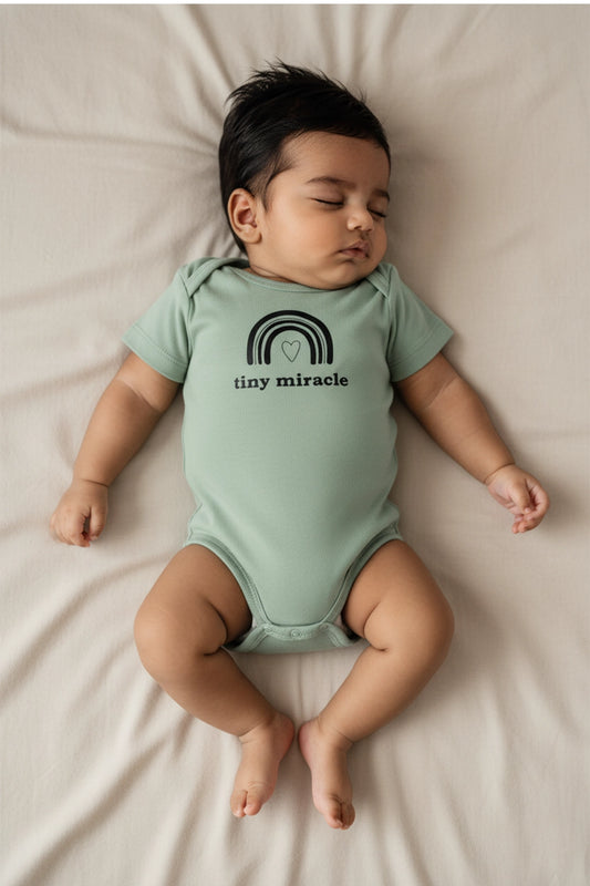 Miracle Babe knitted Onesie