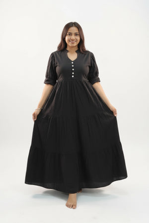 Woman wearing Eclipse Drift Feeding Dress in Black with button detail and flared skirt