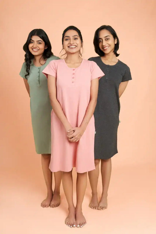 a group of women standing next to each other