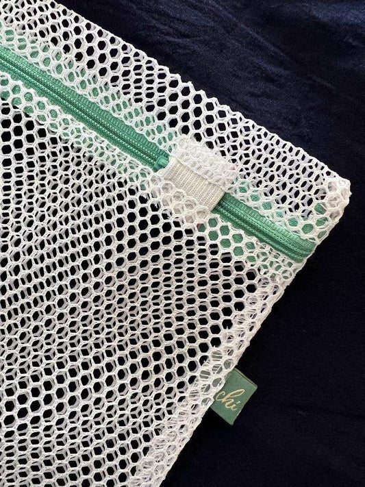 a close up of a tennis court with a tennis racket