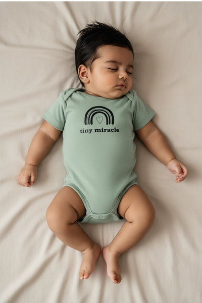 Miracle Babe knitted Onesie