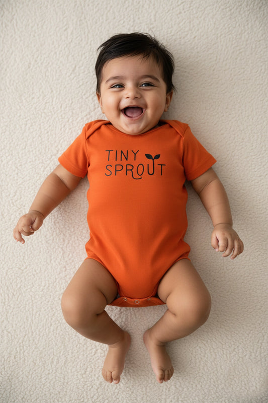 Tiny Grow knitted Onesie