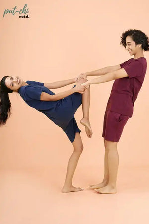 a couple of people that are standing on a beach 