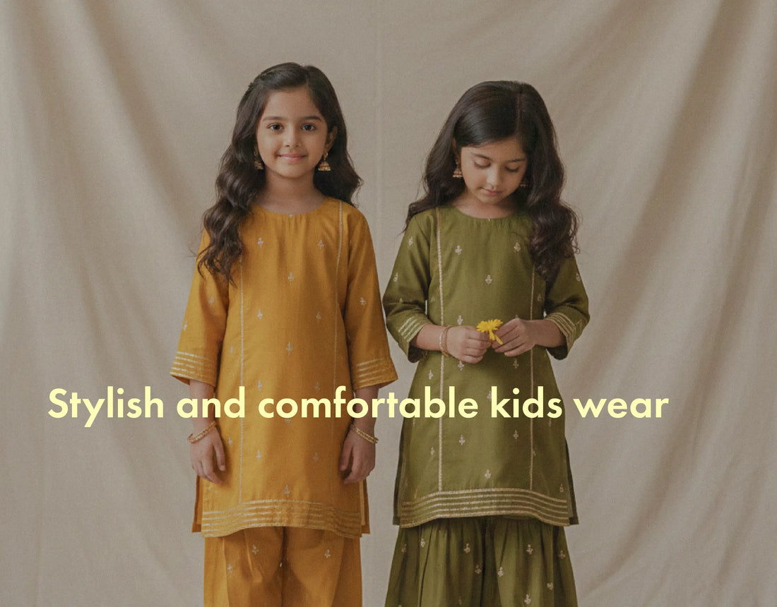 Two children wearing stylish and comfortable kids' clothing with a text overlay on a plain background.